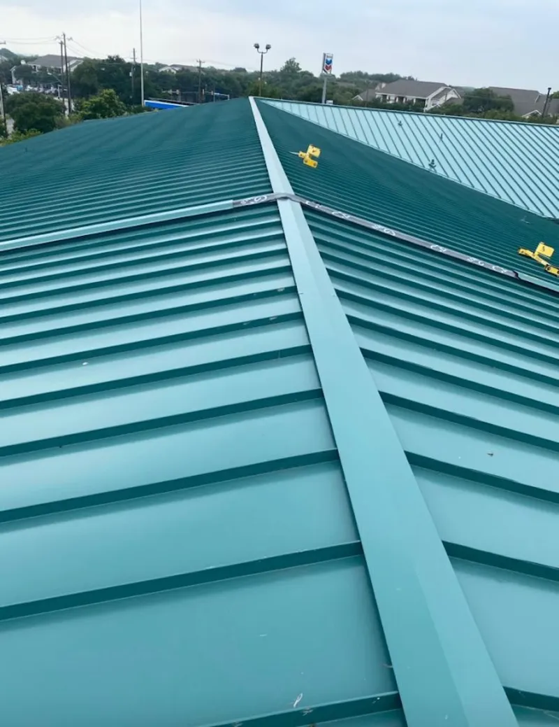 Green commercial metal roof ridge and valley for Metal Roof Repair in Glen Ridge