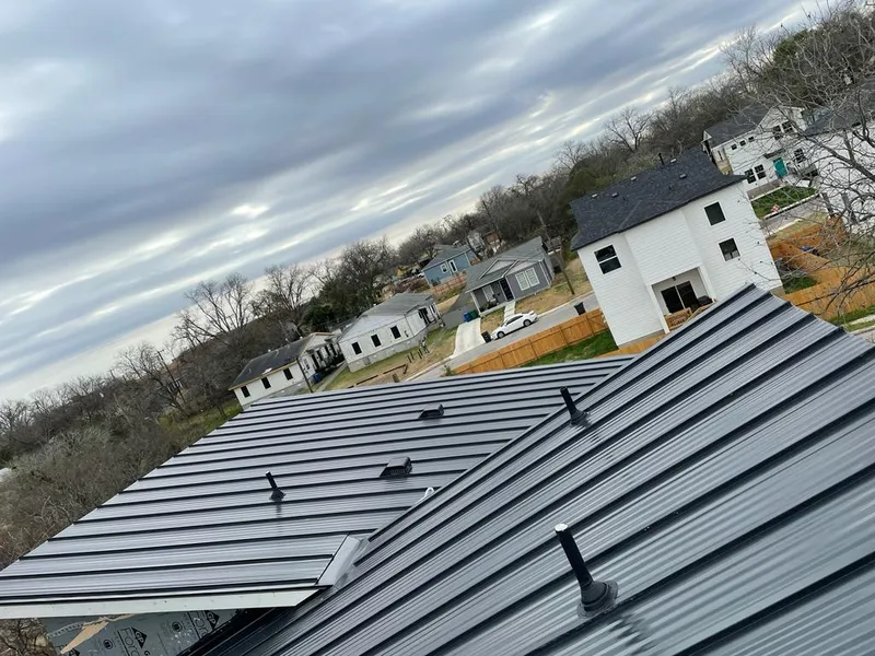 Standing seam metal roof panels with vents for Skylight Repair in Glen Ridge